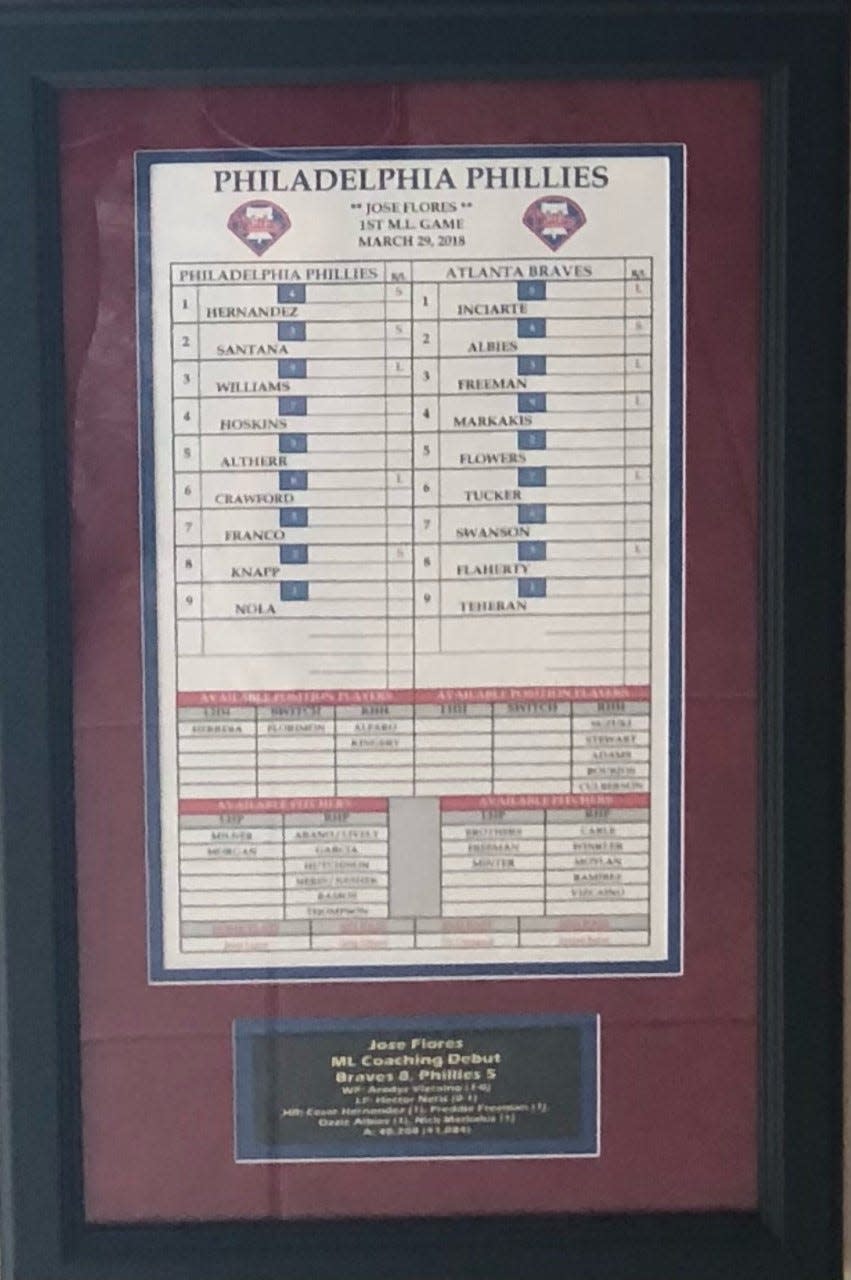 This scorecard was presented to Jose Flores, now the WooSox bench coach, after his first game as a major league first base coach, with the Phillies.