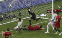 <p>Bundling it home: Diego Costa scores his second goal to haul Spain back level. (AP) </p>