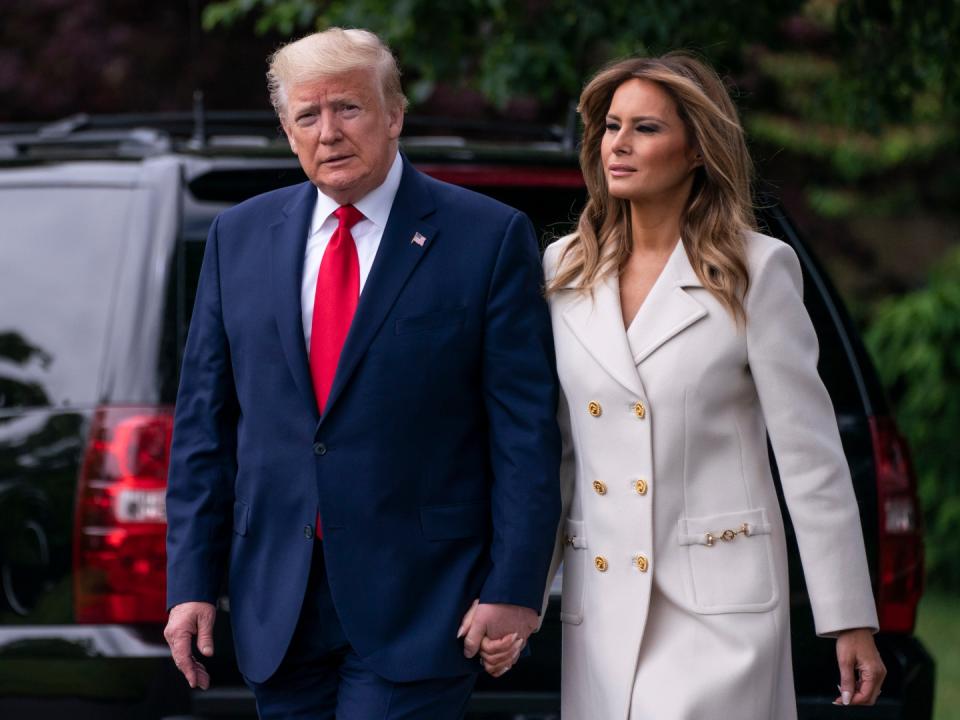 WASHINGTON, DC - MAY 25: U.S. President Donald Trump and First Lady Melania Trump depart from the White House in Washington, DC for a Memorial Day ceremony at the Fort McHenry National Monument and Historic Shrine in Baltimore, on May 25, 2020. (Photo by Sarah Silbiger/Getty Images)