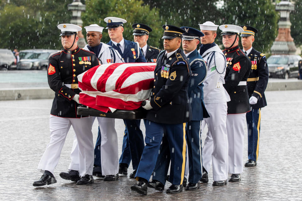 <p>Joint service members of a military casket team carry the casket of Senator John McCain into the US Capitol, where he will lie in state for the rest of the day in Washington, D.C., Aug. 31, 2018. (Photo: Jim Lo Scalzo/Pool via Reuters) </p>