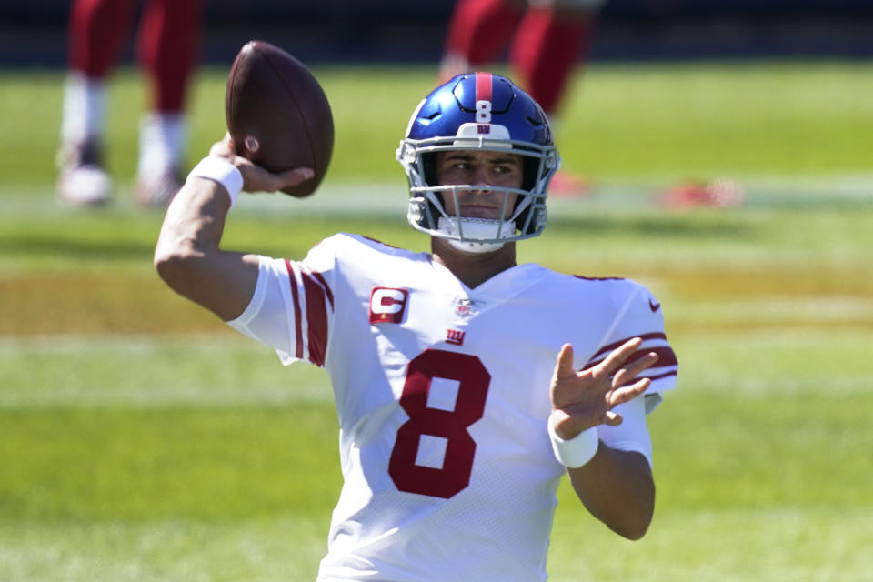 New York Giants quarterback Daniel Jones throws before an NFL football game against the Chicago Bears in Chicago, Sunday, Sept. 20, 2020. (AP Photo/Charles Rex Arbogast)