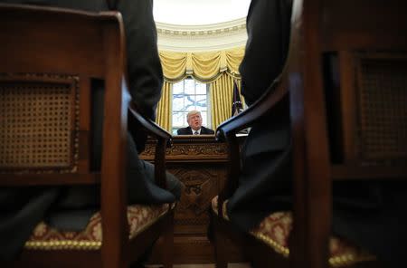 U.S. President Donald Trump speaks during an interview with Reuters in the Oval Office of the White House in Washington, U.S., April 27, 2017. REUTERS/Carlos Barria