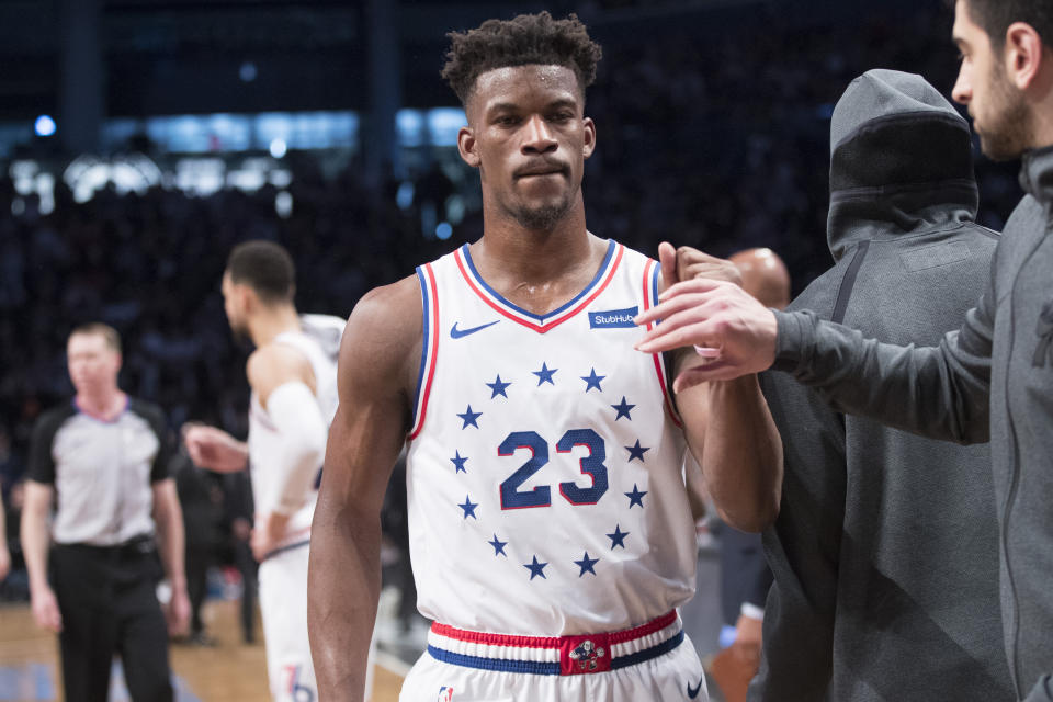 Philadelphia 76ers guard Jimmy Butler (23) leaves the court after being ejected during the second half of Game 4 of a first-round NBA basketball playoff series against the Brooklyn Nets, Saturday, April 20, 2019, in New York. (AP Photo/Mary Altaffer)