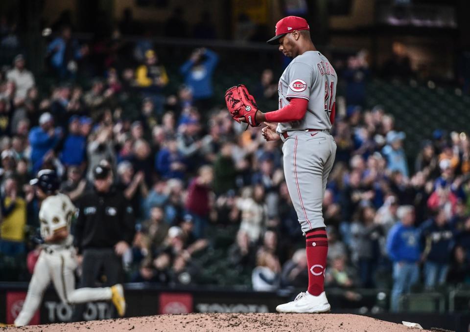 Cincinnati Reds pitcher Hunter Greene (21) reacts after giving up a two-run home run to Milwaukee Brewers shortstop Willy Adames (27) in the second inning at American Family Field in Milwaukee on May 5.