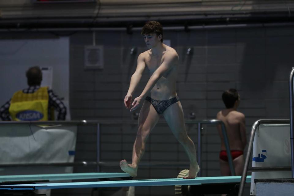 Ryle’s Landon Isler stepped into one of his dives during his state championship-winning performance at the University of Kentucky on Thursday.