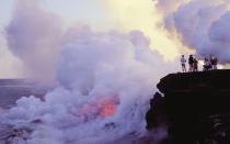 <p>Kilauea Volcano, which has been continuously erupting for more than 30 years, is one of the few places in the world where you can watch magma bubble up from the earth’s crust. View the smoldering caldera from the 11-mile drive around its crater rim; on a wilderness hike; or from the large picture windows of Volcano House, one of Hawaii’s most iconic hotels. <em><a rel="nofollow noopener" href="http://hawaiivolcanohouse.com/" target="_blank" data-ylk="slk:hawaiivolcanohouse.com;elm:context_link;itc:0;sec:content-canvas" class="link ">hawaiivolcanohouse.com</a>; doubles from $285. </em>—Ryan Krogh</p>