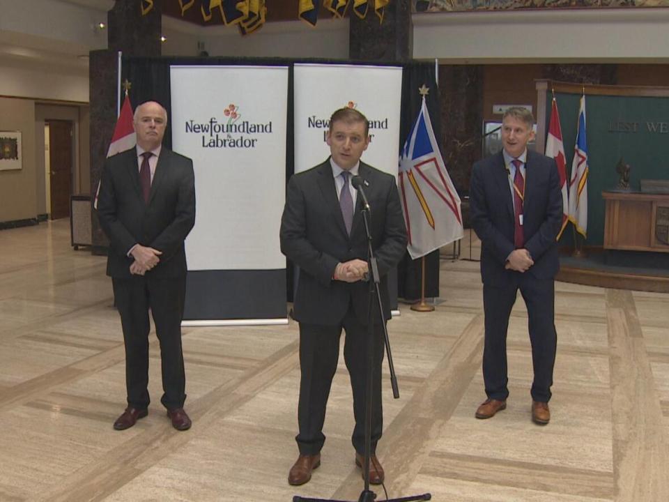 From left, Newfoundland and Labrador Health Minister Tom Osborne, Premier Andrew Furey and Eastern Health clinical chief of cardiac care Dr. Sean Connors answered questions Tuesday about the province's fly-in, fly out cardiac service. (Ted Dillon/CBC - image credit)