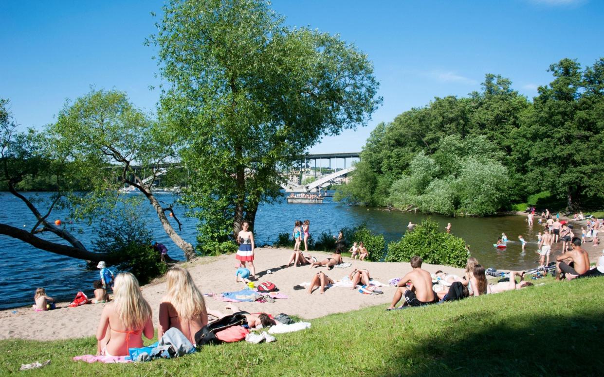 People on the beach of Langholmen, Stockholm