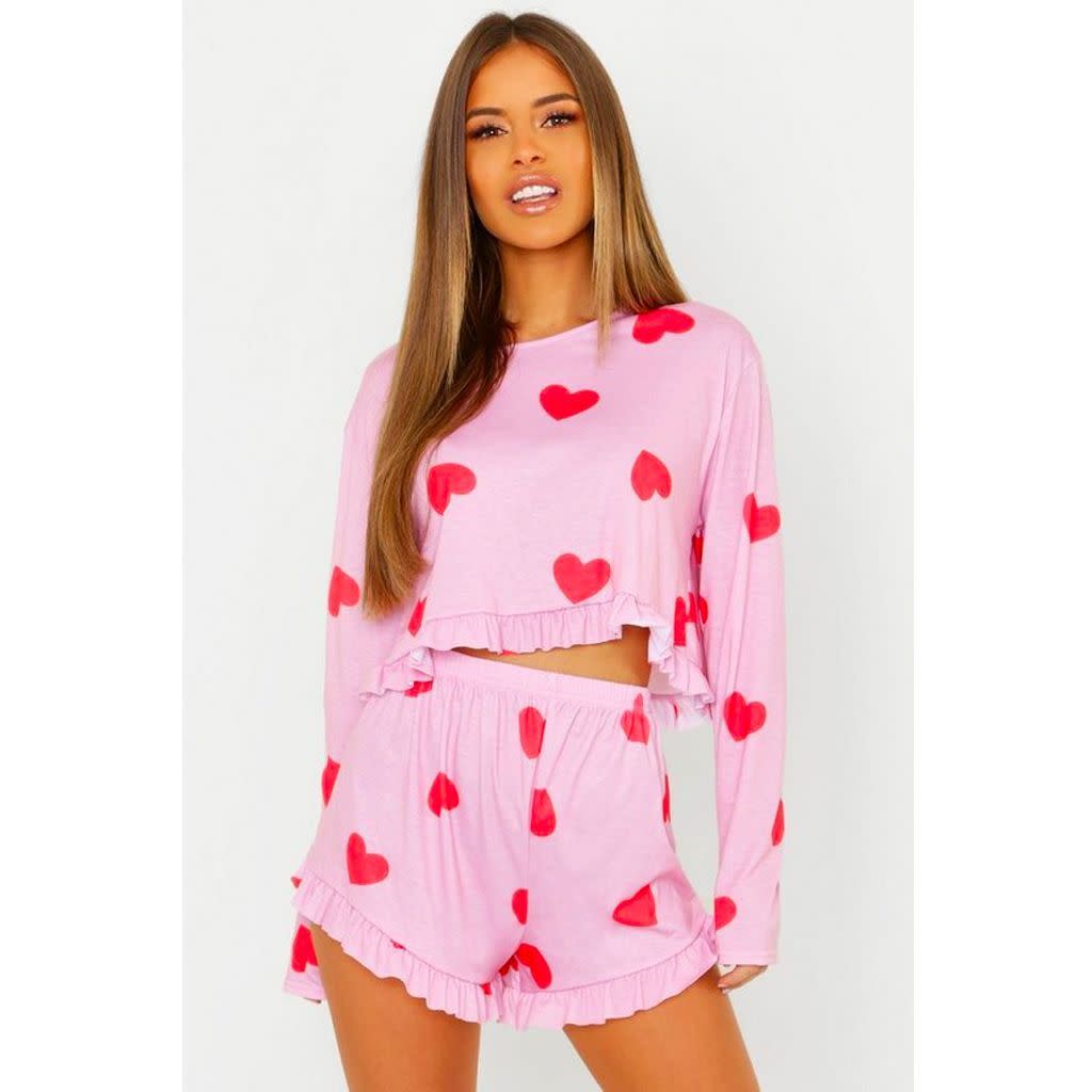 <p><a href="https://go.redirectingat.com?id=74968X1596630&url=https%3A%2F%2Fus.boohoo.com%2Fpetite-heart-print-frill-hem-pj-short-set%2FPZZ74339.html%3Fcolor%3D155&sref=https%3A%2F%2F" rel="nofollow noopener" target="_blank" data-ylk="slk:Shop Now;elm:context_link;itc:0;sec:content-canvas" class="link rapid-noclick-resp">Shop Now</a></p><p>Petite Heart Print Frill Hem PJ Short Set</p><p>boohoo.com</p><p>$15.00</p>