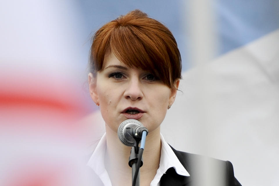 FILE - In this April 21, 2013 file photo, Maria Butina, leader of a pro-gun organization in Russia, speaks to a crowd during a rally in support of legalizing the possession of handguns in Moscow, Russia. A new report by Oregon Sen. Ron Wyden, the top Democrat on the Senate Finance Committee, charges The National Rifle Association acted as a "foreign asset" for Russia in the run-up to the 2016 election and NRA insiders provided access to the American political system to advance personal business interests. The report also said NRA leaders may have violated tax laws that prohibit use of organization resources for personal benefit. The report, based on an 18-month investigation by the finance panel’s Democratic staff, found that NRA leaders "engaged in a years-long effort to facilitate the U.S.-based activities" of Russian nationals Maria Butina and Alexander Torshin. (AP Photo/File)