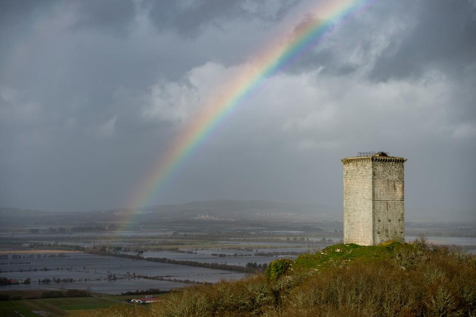 A rainbow is pictured over flooded fields in Xinzo de Limia following heavy rains. (Getty)