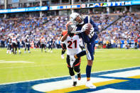 <p>Wide receiver Keenan Allen #13 of the Los Angeles Chargers makes a catch in front of defensive back Darqueze Dennard #21 of the Cincinnati Bengals for a touchdown in the first quarter to lead 7-0 at StubHub Center on December 9, 2018 in Carson, California. (Photo by Sean M. Haffey/Getty Images) </p>