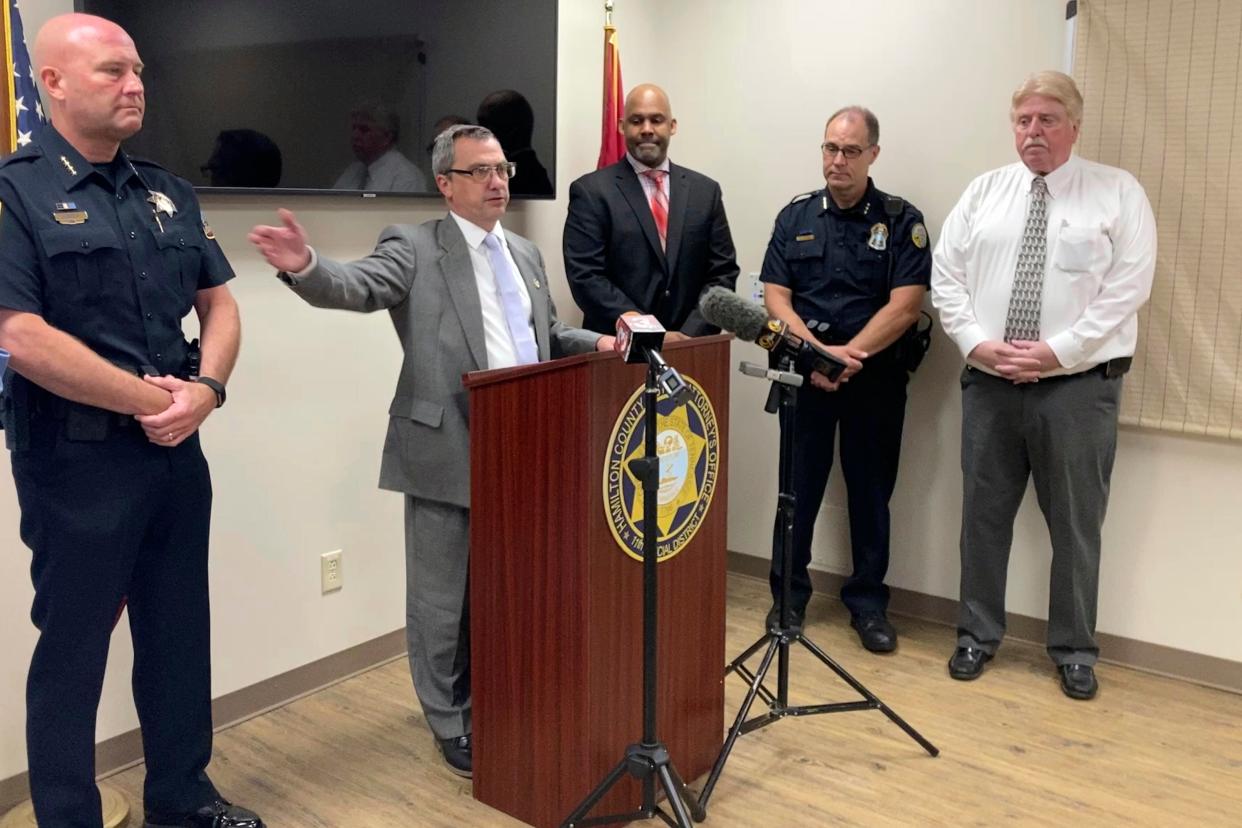 Hamilton County District Attorney Neal Pinkston, centre, speaks at a news conference, Wednesday, June 9, 2021, in Chattanooga, Tennessee (AP)