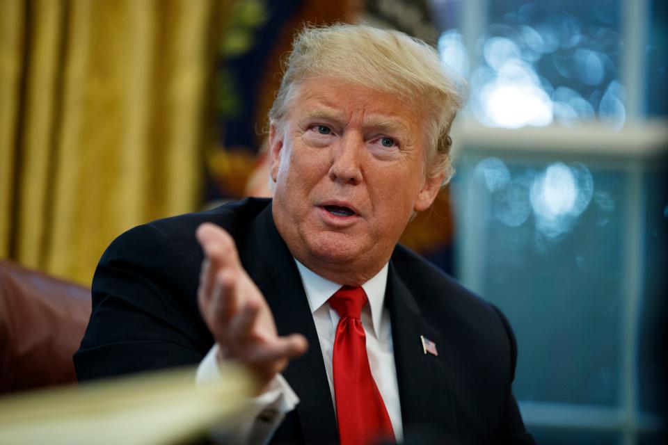 President Donald Trump speaks during an interview with The Associated Press in the Oval Office of the White House, Tuesday, Oct. 16, 2018, in Washington. (AP Photo/Evan Vucci)