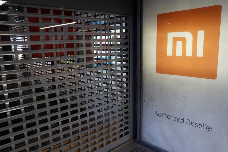 FILE PHOTO: Xiaomi logo is seen on a closed brand's store in central Kiev