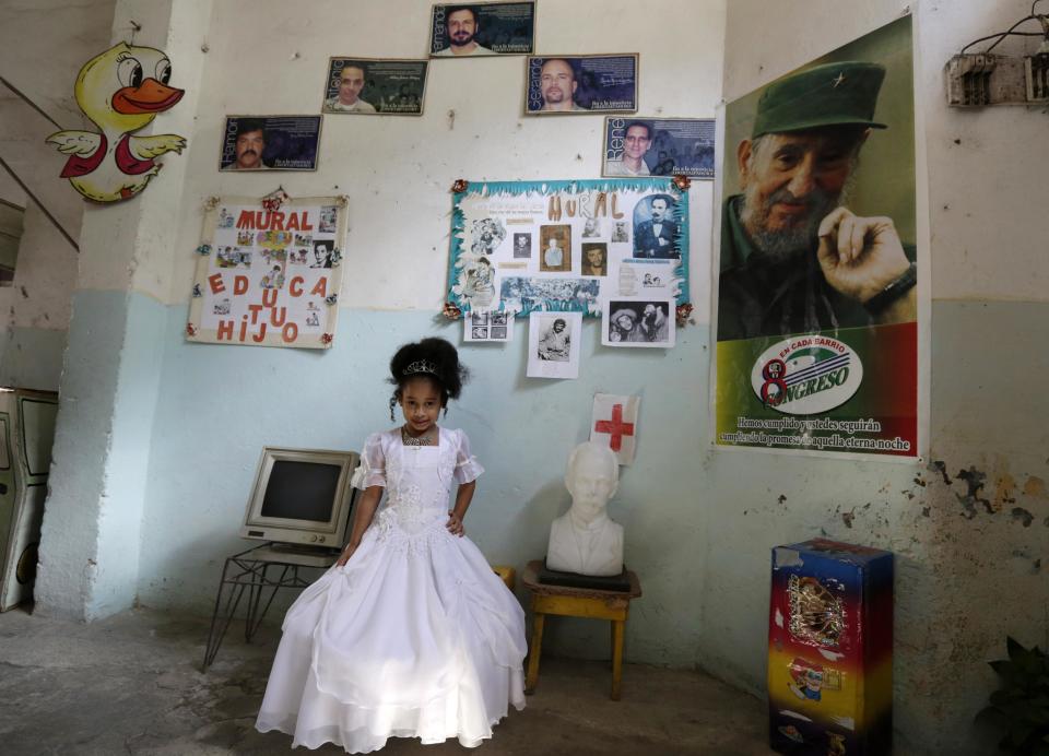 Kindergarten student at the Enrique Villuendas Primary School, Arleny Villar, poses in her princess costume in Havana