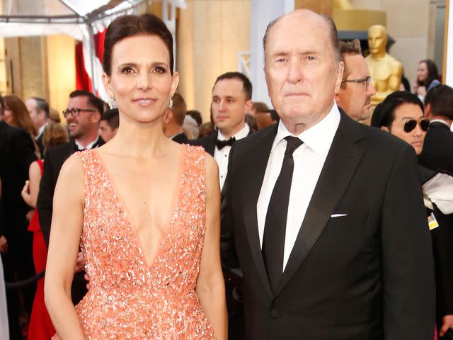<p>Jeff Vespa/WireImage</p> Robert Duvall and Luciana Pedraza attend the 87th Annual Academy Awards on February 22, 2015 in Hollywood, California.