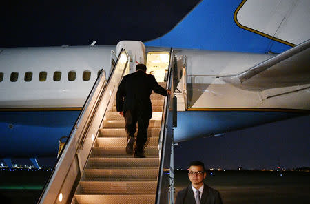 U.S. Secretary of State Mike Pompeo boards a plane before departing from Baghdad International Airport in Baghdad, Iraq May 7, 2019. Mandel Ngan/Pool via REUTERS