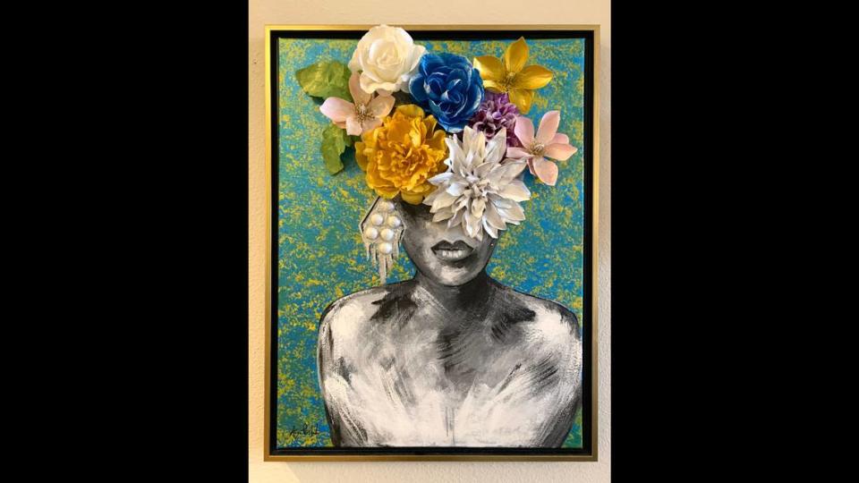 “Female Blue Flower Goddess,” a mixed media artwork by Angie Pasternak, one of the artists featured in the upcoming “Botanicals & Blooms III” exhibit at Green Door Art Gallery in Webster Groves, Missouri