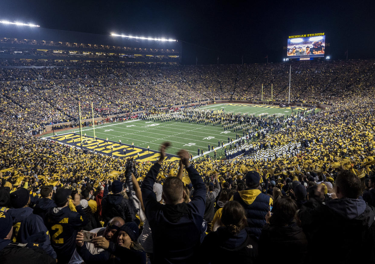 Two people were arrested after allegedly flying a drone over Michigan Stadium during their season opener against Middle Tennessee State on Saturday.