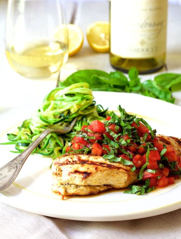 <p>From A Chef's Kitchen</p><p>Italian-inspired, light, fresh, and filled with nourishment, this chicken and zucchini dish is perfect if you two want to eat healthy but still envelop your senses in indulgent flavors. </p><p><strong>Get the recipe: <a href="https://www.fromachefskitchen.com/chicken-bruschetta-zucchini-noodles/" rel="nofollow noopener" target="_blank" data-ylk="slk:Chicken Bruschetta with Zucchini Noodles;elm:context_link;itc:0;sec:content-canvas" class="link rapid-noclick-resp">Chicken Bruschetta with Zucchini Noodles</a></strong></p>