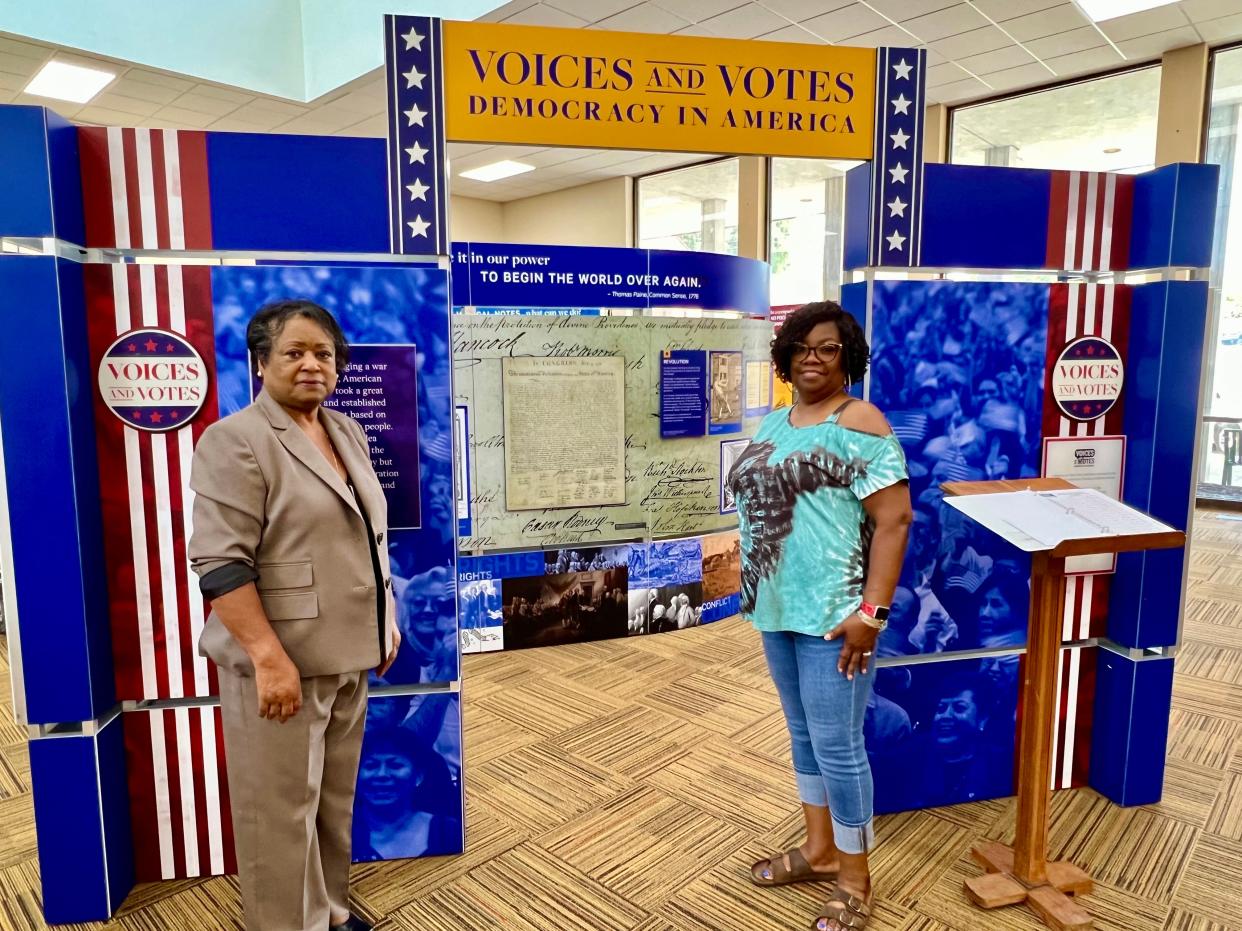 From left, African American Heritage Society of Maury County founder and President Jo Ann McClellan stands with Maury County Library interim Director Jackie Burkeen at the new Voices and Votes: Democracy in America exhibit, which will be on display until Oct. 1