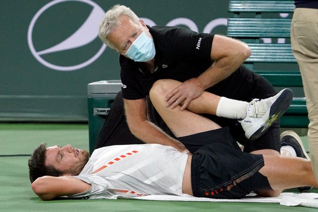 Cameron Norrie needed treatment for a sore hip during his loss to Carlos Alcaraz