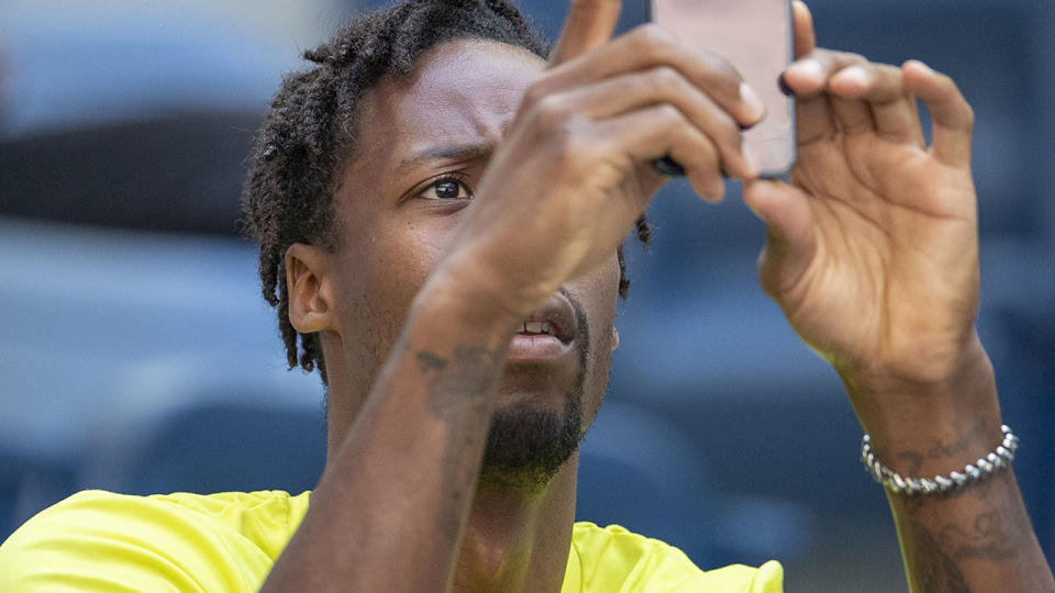 Gael Monfils, pictured here watches on during Elina Svitolina's match at the US Open.