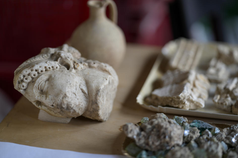 A double-faced Junus head, approximately dated to the1st century A.D., is seen among other findings coming from the excavation of ancient Roman emperor Nero's theater, during a press preview, in Rome, Wednesday, July 26, 2023. The ruins of Nero's Theater, an imperial theater referred to ancient Roman texts but never found, have been discovered under the garden of the future Four Season's Hotel, steps from the Vatican, after excavating the walled garden of the Palazzo della Rovere since 2020, as part of planned renovations on the Renaissance building. (AP Photo/Andrew Medichini)