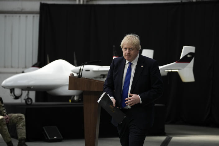 British Prime Minister Boris Johnson walks away after delivering a speech to members of the armed services and Maritime and Coastguard Agency at Lydd airport in Kent. Picture date: Thursday April 14, 2022.