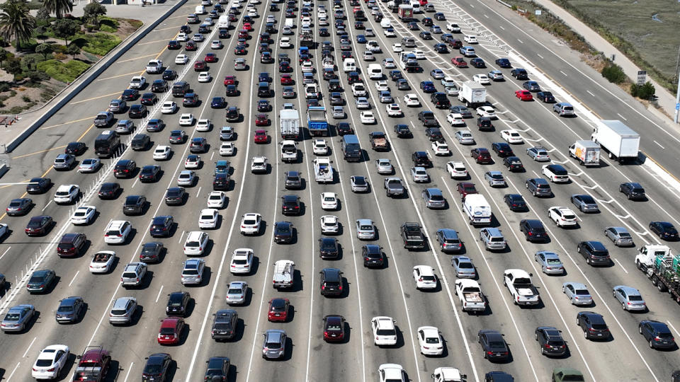 Eighteen lines of traffic back up before the San Francisco-Oakland Bay Bridge toll plaza.