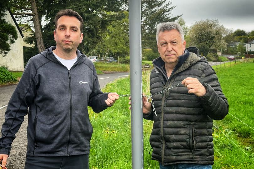 Resident Mark Petrie (left) and Cllr Angus Forbes were shocked to discover Pop-up Jim had been stolen