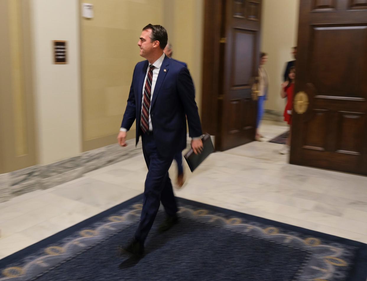 Gov. Kevin Stitt arrives at the Blue Room at the Oklahoma Capitol.