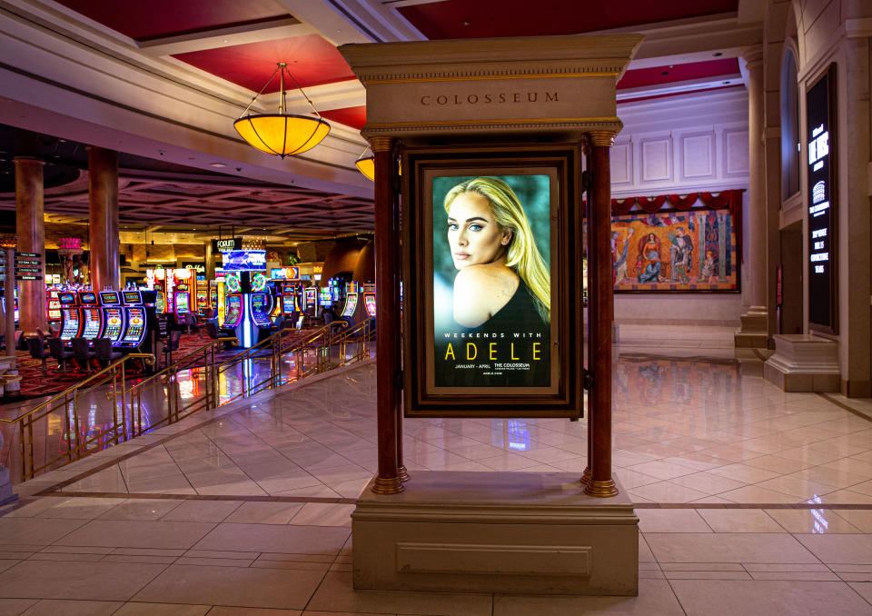 LAS VEGAS, NV - JANUARY 9:  A promotional billboard touting the upcoming concerts by singer Adele is viewed inside Caesars Palace Hotel & Casino on January 9, 2022 in Las Vegas, Nevada. Conventions, gamblers, and record gaming profits have once again returned to Sin City despite a surge of infections and hospitalizations due to the Omicron Covid virus. (Photo by George Rose/Getty Images)