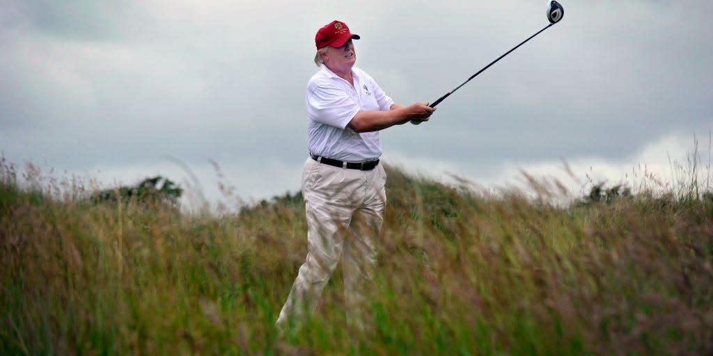 Donald Trump golfing at Trump International Golf Links course in Aberdeenshire, Scotland