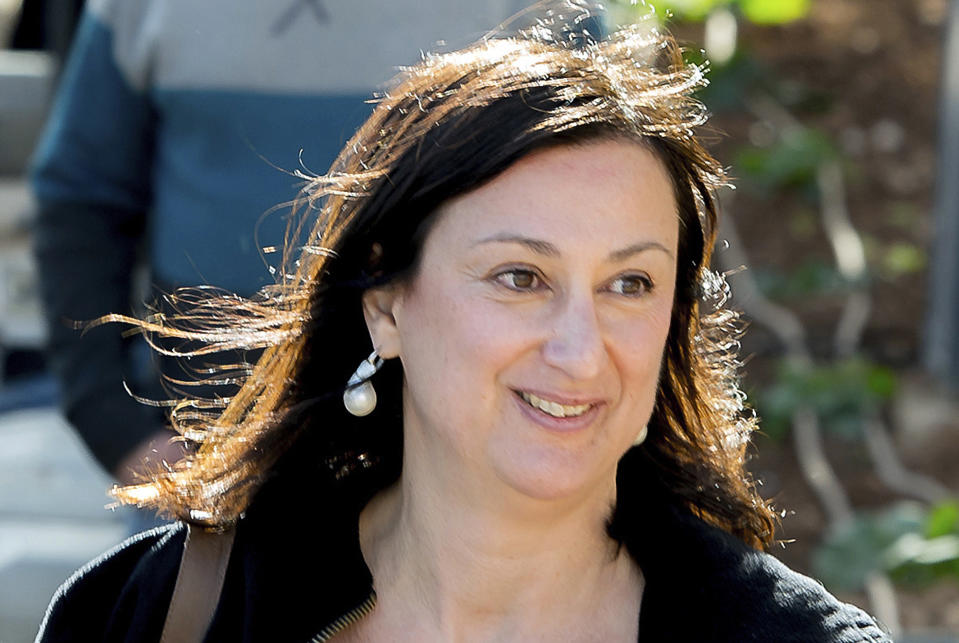 FILE - This April 4, 2016 file photo shows Maltese investigative journalist Daphne Caruana Galizia, who was killed by a car bomb in Malta on Oct. 16, 2017. Maltese authorities say a man arrested in a money-laundering case claims to have information identifying the mastermind behind the assassination of Daphne Caruana Galizia. (AP Photo/Jon Borg, File)