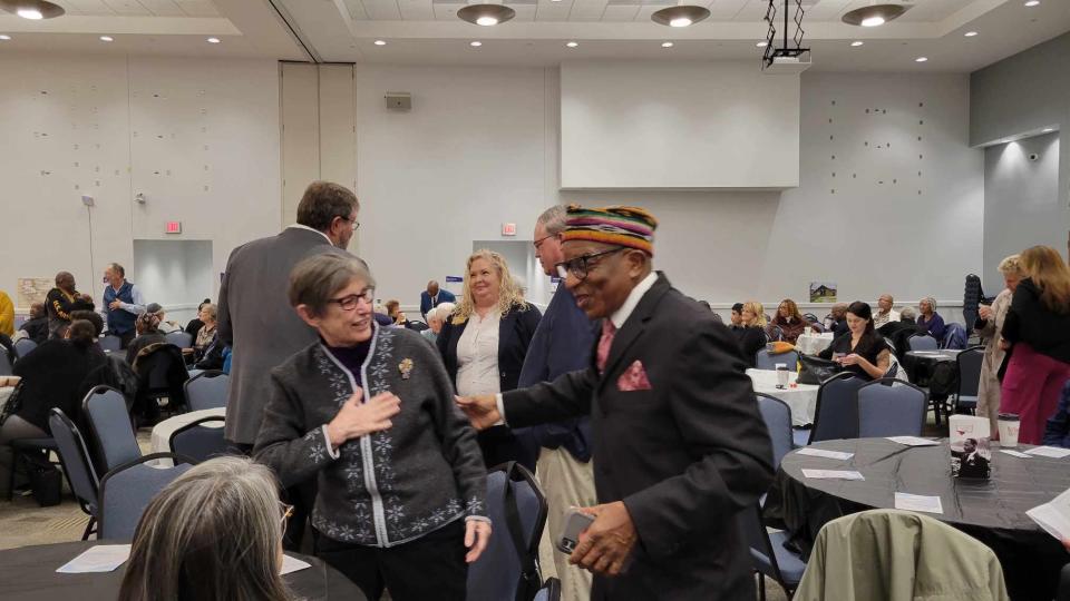 Ronnie Pepper greets people in the crowd Jan. 15, Dr. Martin Luther King Jr. Day, during the MLK Unity Breakfast at Blue Ridge Community College.