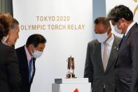 Display ceremony for the Olympic Flame at the Olympic Museum in Tokyo