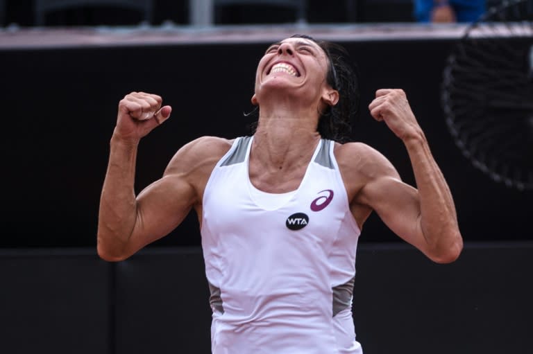 Francesca Schiavone of Italy reacts after beating Shelby Rogers of the US during their women's singles final match at the 2016 Rio Open tennis tournament on Februrary 21, 2016