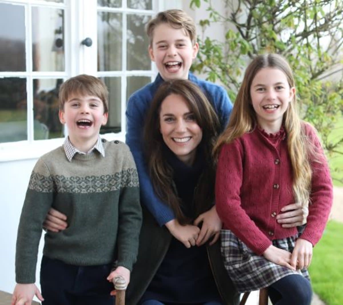 The photograph of Kate with her three children that has provoked a storm (Kensington Palace)