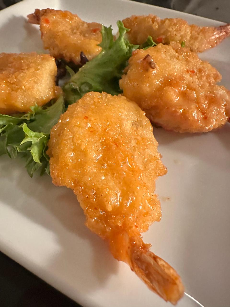 Generously sized and perfectly cooked breaded shrimp were part of my surf n' turf special at Tozzi's Restaurant of Magnolia.
