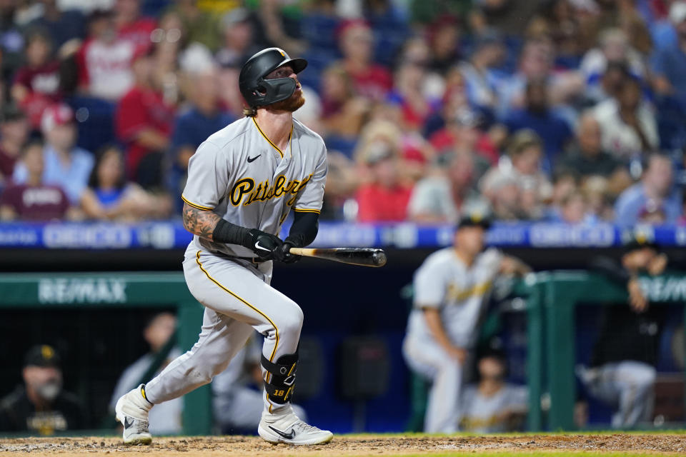 Pittsburgh Pirates' Ben Gamel follows through after hitting a home run against Philadelphia Phillies pitcher Connor Brogdon during the seventh inning of a baseball game, Friday, Aug. 26, 2022, in Philadelphia. (AP Photo/Matt Slocum)