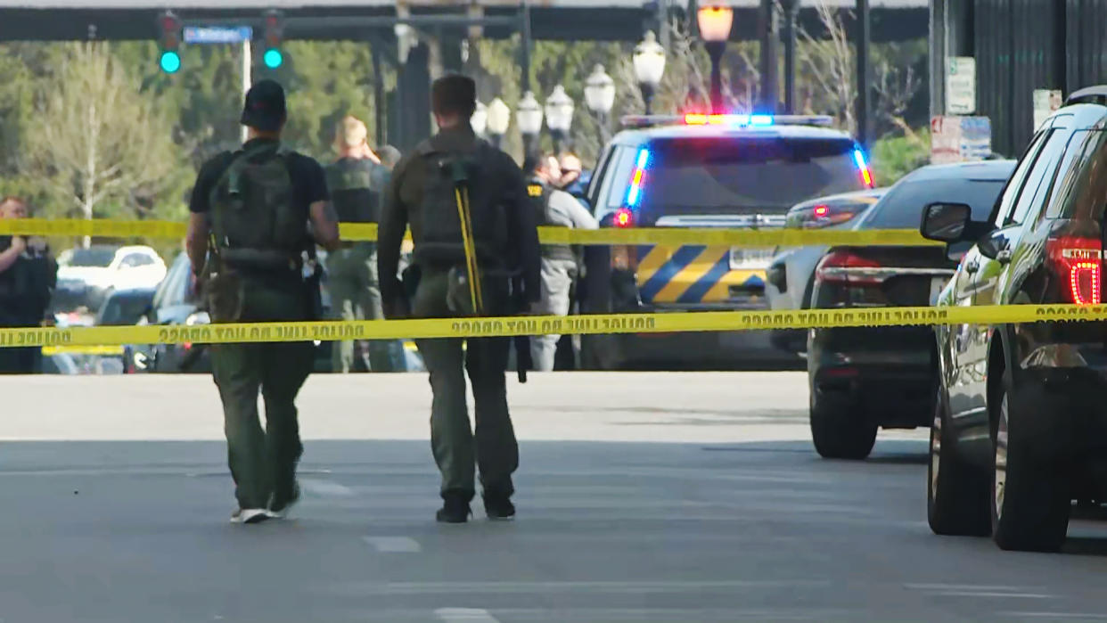 Police respond near the scene of shootings in Louisville, Ky., on April 10, 2023. (WAVE)