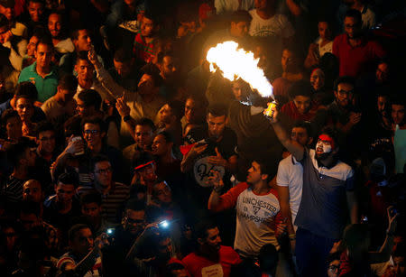 Fans celebrate a goal in a soccer match against Congo that could see Egypt qualifying for the World Cup, in Cairo, Egypt October 8, 2017. REUTERS/Mohamed Abd El Ghany