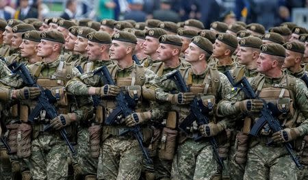 Servicemen march during Ukraine's Independence Day military parade in central Kiev, Ukraine, August 24, 2016. REUTERS/Gleb Garanich