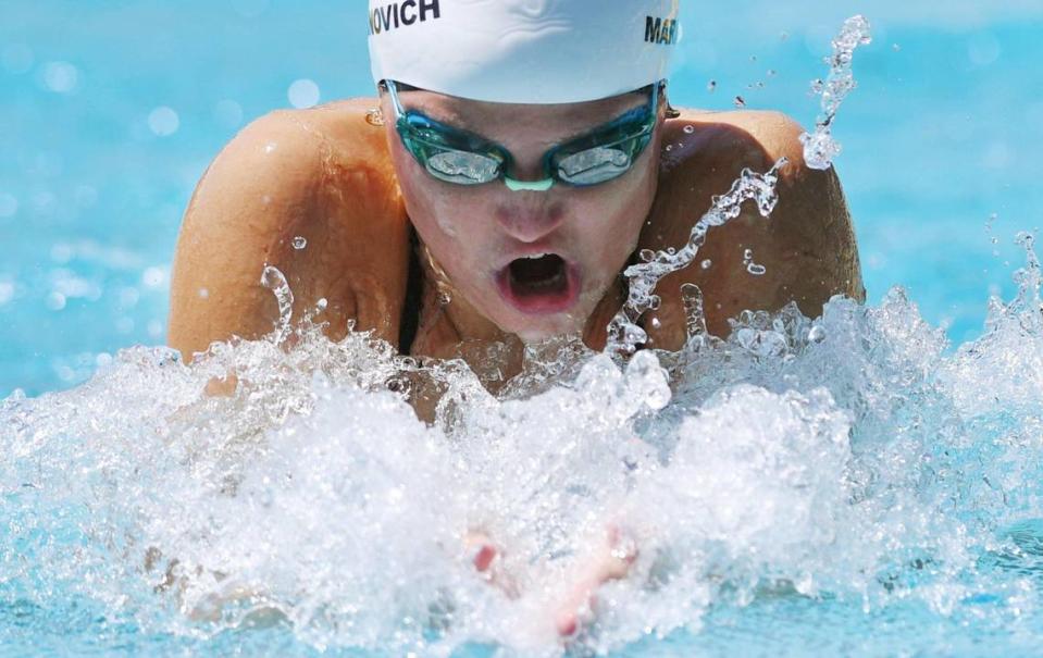 Clovis West’s Hannah Marinovich Swimmers competes in the Girls 100 Yard Breaststroke at the Clovis West Invitational Saturday, April 15, 2023 in Fresno. Clovis Unified’s Olympic Swim Complex at Clovis West opened this week after being closed almost a year for renovation and construction. ERIC PAUL ZAMORA/ezamora@fresnobee.com