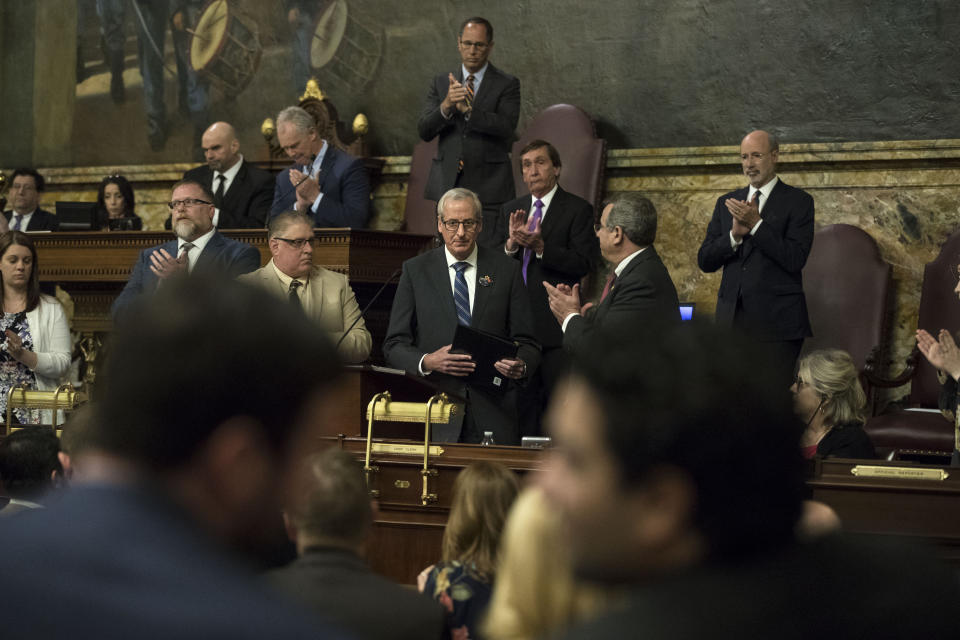 State Rep. Dan Frankel, D-Allegheny receives the applause of joint session of Pennsylvania lawmakers who came together to commemorate the victims of the Pittsburgh synagogue attack that killed 11 people last year, Wednesday, April 10, 2019, at the state Capitol in Harrisburg, Pa. (AP Photo/Matt Rourke)