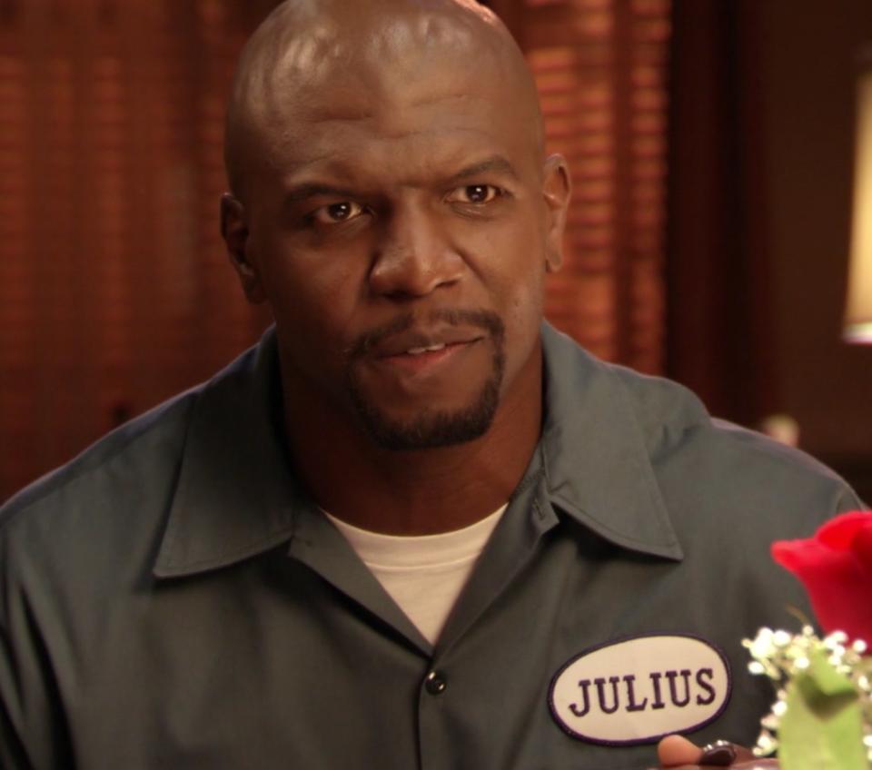 Terry Crews as Julius eats at a family dinner in "Everybody Hates Chris"