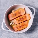 <p>Fatty fish, like salmon, are rich in omega-3s and a <a href="https://www.prevention.com/food-nutrition/healthy-eating/g23065278/high-protein-foods/" rel="nofollow noopener" target="_blank" data-ylk="slk:good source of lean protein;elm:context_link;itc:0;sec:content-canvas" class="link ">good source of lean protein</a>. And while fat has more than double the calories of protein and carbohydrates, it is key to keeping your cravings in check. “Salmon is not only satisfying and delicious, but it will also make your skin glow, reduce your risk of disease, and even curb your hunger,” Mirkin says. </p><p><strong>Try it:</strong> <a href="https://www.prevention.com/food-nutrition/recipes/a26986386/salmon-avocado-tomato-salad-recipe/" rel="nofollow noopener" target="_blank" data-ylk="slk:Salmon Salad with Avocado and Sweet Grape Tomatoes;elm:context_link;itc:0;sec:content-canvas" class="link ">Salmon Salad with Avocado and Sweet Grape Tomatoes</a></p>