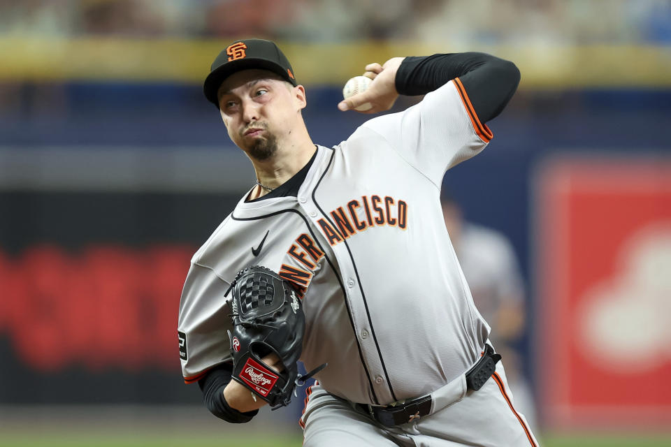 San Francisco Giants starting pitcher Blake Snell throws against the Tampa Bay Rays during the first inning of a baseball game Sunday, April 14, 2024, in St. Petersburg, Fla. (AP Photo/Mike Carlson)